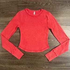 FP Movement by Free People Long Sleeve Cropped Tee in Coral Red